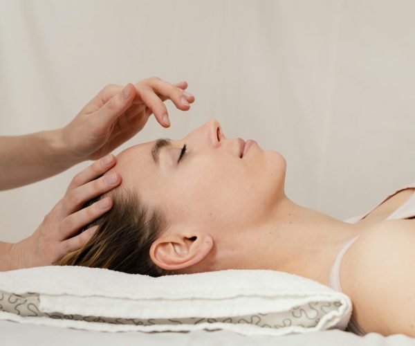 close-up-therapist-massaging-patient-s-head